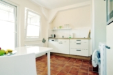Küche mit Esstisch - Zwischen Stöckach und Ostendplatz – 3-Zimmer-Wohnung mit Flair nahe Stadtpark