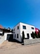 HAUSANSICHT MIT GARAGE - Neubau-Traum von 2023 – Stilvolles Einfamilienhaus mit zwei Terrassen und exklusiver Ausstattung